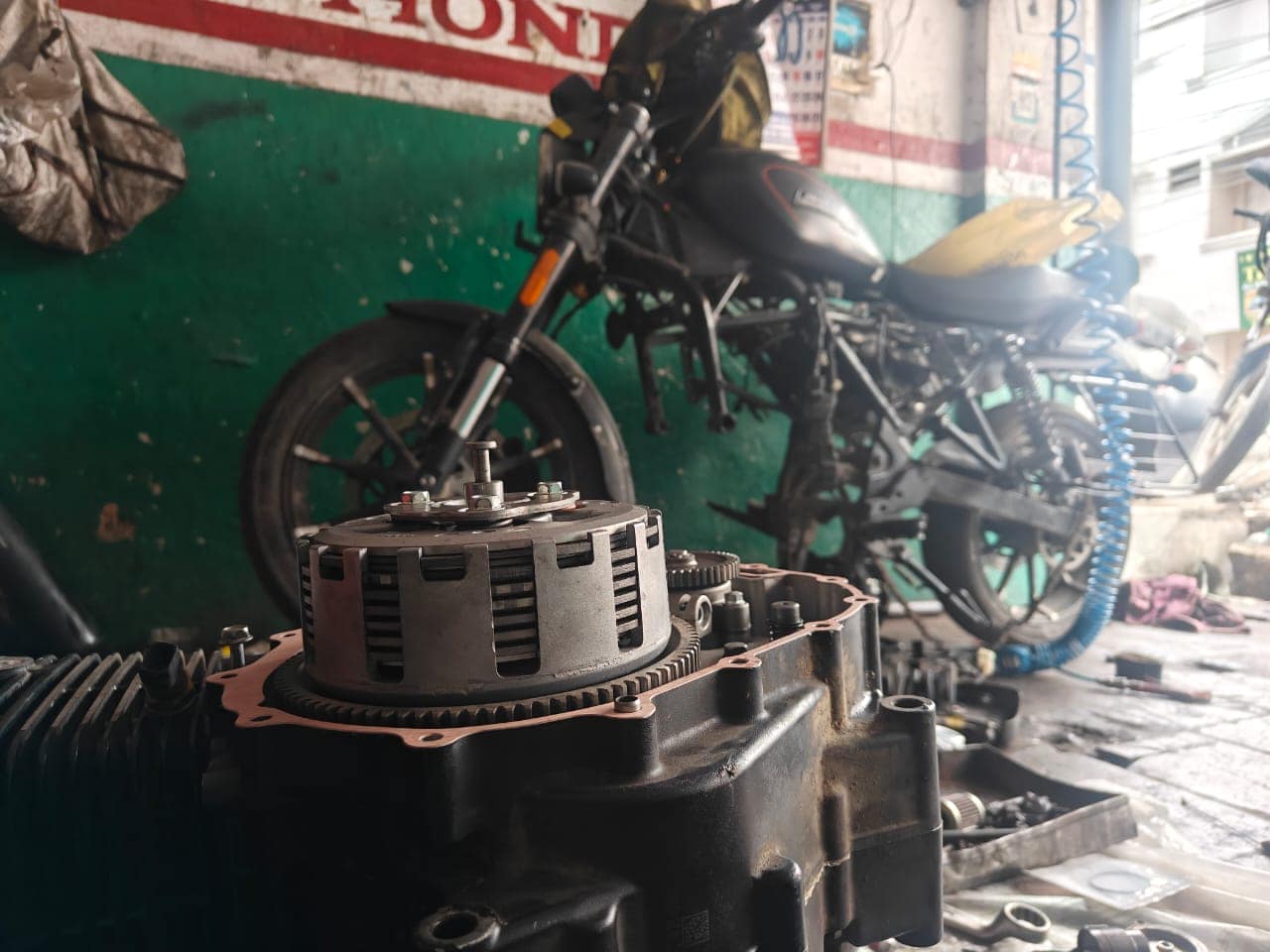 Bike engine stripped for repair at the Smart Mechanik workshop